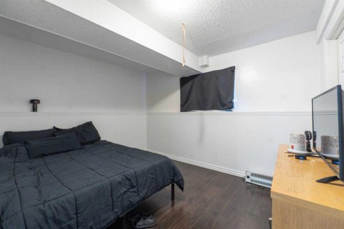 27 Erin Grove Court Se, Calgary, AB - Indoor Photo Showing Bedroom