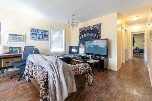 27 Erin Grove Court Se, Calgary, AB - Indoor Photo Showing Bedroom