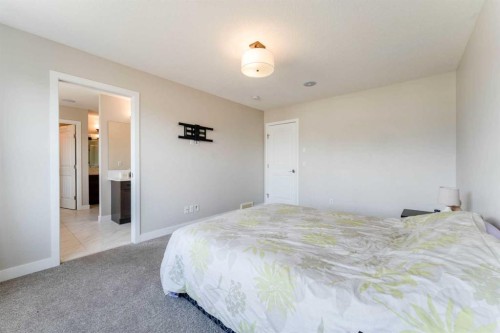 42 Buckskin Way, Cochrane, AB - Indoor Photo Showing Bedroom