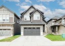 42 Buckskin Way, Cochrane, AB  - Outdoor With Facade 