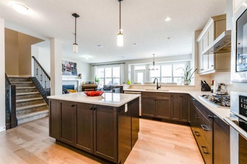 42 Buckskin Way, Cochrane, AB - Indoor Photo Showing Kitchen With Upgraded Kitchen