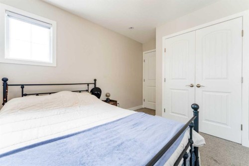 42 Buckskin Way, Cochrane, AB - Indoor Photo Showing Bedroom