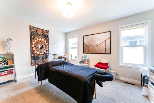42 Buckskin Way, Cochrane, AB - Indoor Photo Showing Bedroom