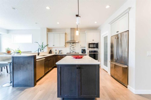 42 Buckskin Way, Cochrane, AB - Indoor Photo Showing Kitchen With Stainless Steel Kitchen With Upgraded Kitchen
