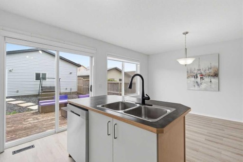 30 Tuscany Springs Heights Nw, Calgary, AB - Indoor Photo Showing Kitchen With Double Sink
