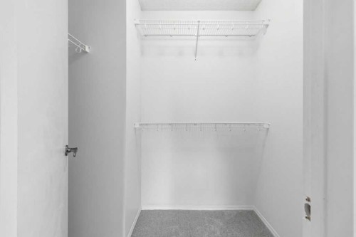 30 Tuscany Springs Heights Nw, Calgary, AB - Indoor With Storage