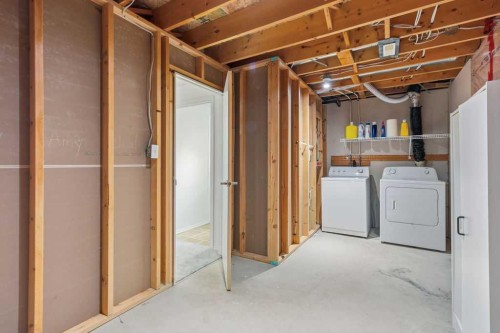 30 Tuscany Springs Heights Nw, Calgary, AB - Indoor Photo Showing Laundry Room