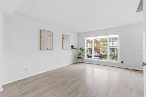 30 Tuscany Springs Heights Nw, Calgary, AB - Indoor Photo Showing Living Room