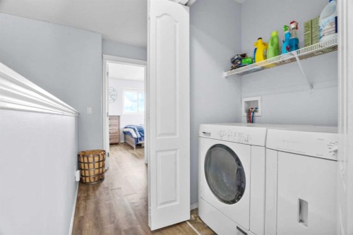 302 Sunrise Terrace Ne, High River, AB - Indoor Photo Showing Laundry Room