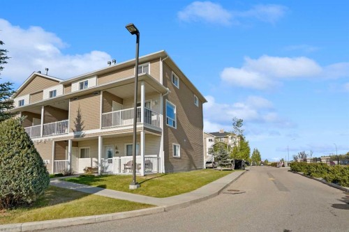 302 Sunrise Terrace Ne, High River, AB - Outdoor With Facade