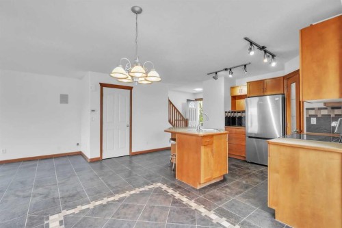 141 Cramond Close Se, Calgary, AB - Indoor Photo Showing Kitchen