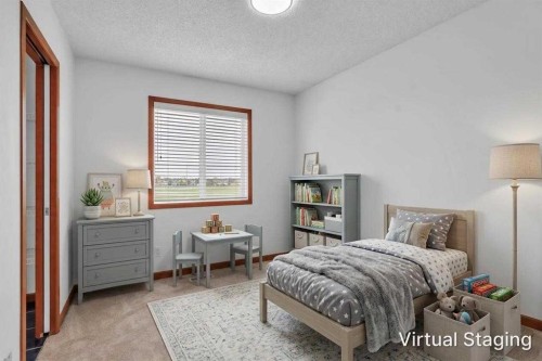 141 Cramond Close Se, Calgary, AB - Indoor Photo Showing Bedroom