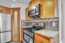 141 Cramond Close Se, Calgary, AB  - Indoor Photo Showing Kitchen 