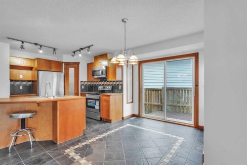 141 Cramond Close Se, Calgary, AB - Indoor Photo Showing Kitchen