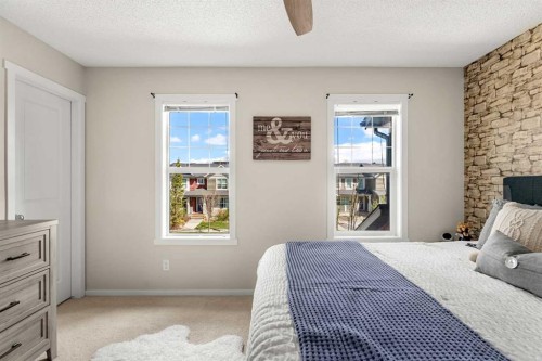 40 Sunvalley Road, Cochrane, AB - Indoor Photo Showing Bedroom