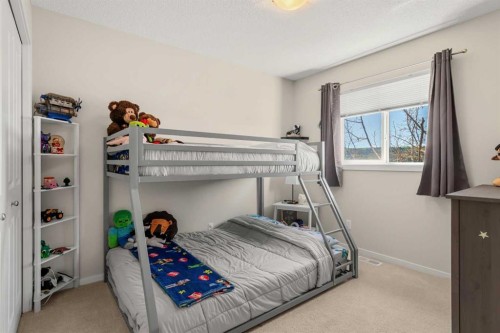 40 Sunvalley Road, Cochrane, AB - Indoor Photo Showing Bedroom