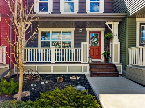 40 Sunvalley Road, Cochrane, AB - Outdoor With Deck Patio Veranda With Facade
