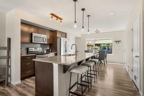 40 Sunvalley Road, Cochrane, AB - Indoor Photo Showing Kitchen With Stainless Steel Kitchen With Upgraded Kitchen