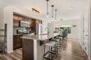 40 Sunvalley Road, Cochrane, AB  - Indoor Photo Showing Kitchen With Stainless Steel Kitchen With Upgraded Kitchen 