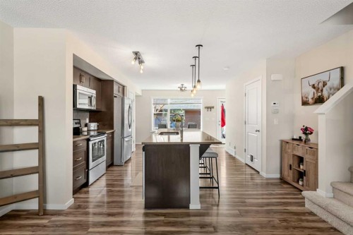 40 Sunvalley Road, Cochrane, AB - Indoor Photo Showing Kitchen With Upgraded Kitchen