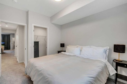 541 Marine Drive Se, Calgary, AB - Indoor Photo Showing Bedroom