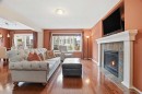 56 Everglen Way Sw, Calgary, AB  - Indoor Photo Showing Living Room With Fireplace 