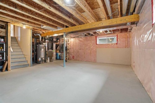 56 Everglen Way Sw, Calgary, AB - Indoor Photo Showing Basement