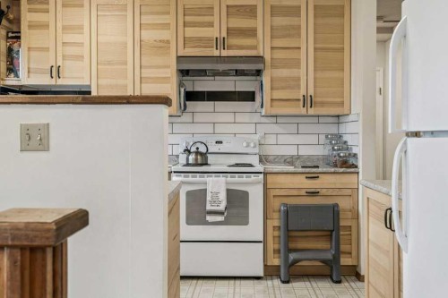 840 Pinecliff Drive Ne, Calgary, AB - Indoor Photo Showing Kitchen