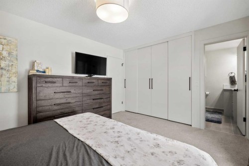 263 Silvergrove Place Nw, Calgary, AB - Indoor Photo Showing Bedroom