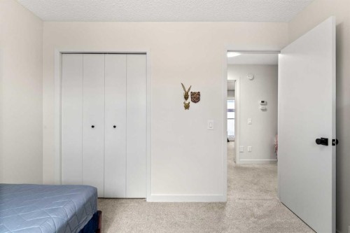 263 Silvergrove Place Nw, Calgary, AB - Indoor Photo Showing Bedroom