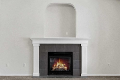 53 Royal Birch Way Nw, Calgary, AB - Indoor Photo Showing Living Room With Fireplace