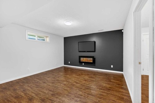 53 Royal Birch Way Nw, Calgary, AB - Indoor With Fireplace