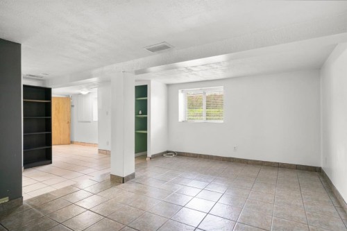 1404 18 Avenue Nw, Calgary, AB - Indoor Photo Showing Other Room