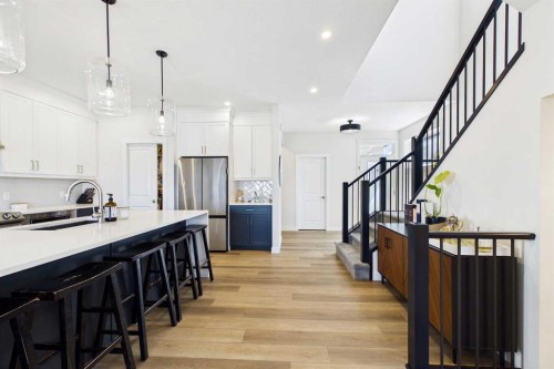 59 Royston Rise Nw, Calgary, AB - Indoor Photo Showing Kitchen With Upgraded Kitchen