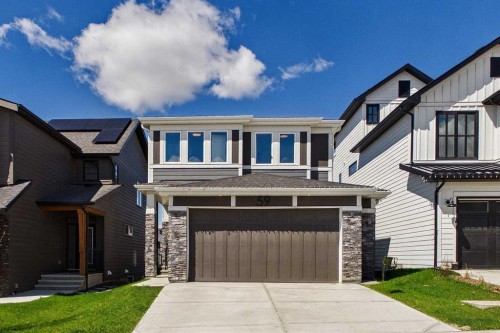 59 Royston Rise Nw, Calgary, AB - Outdoor With Facade