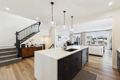 59 Royston Rise Nw, Calgary, AB - Indoor Photo Showing Kitchen With Double Sink With Upgraded Kitchen