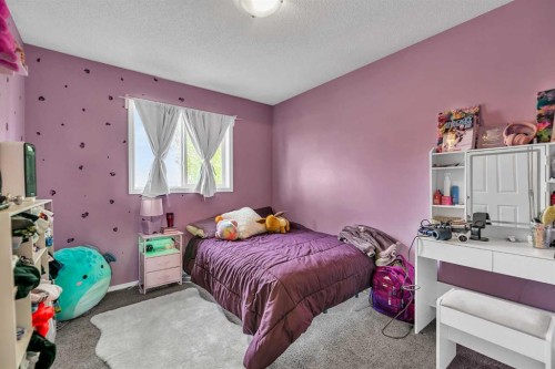 242 Copperstone Grove Se, Calgary, AB - Indoor Photo Showing Bedroom