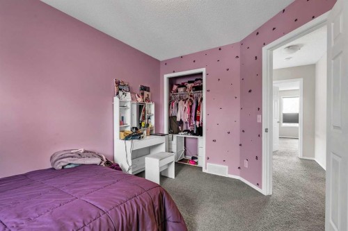 242 Copperstone Grove Se, Calgary, AB - Indoor Photo Showing Bedroom
