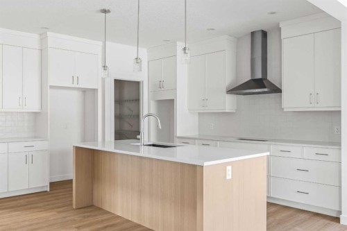 486 Lucas Way Nw, Calgary, AB - Indoor Photo Showing Kitchen With Upgraded Kitchen