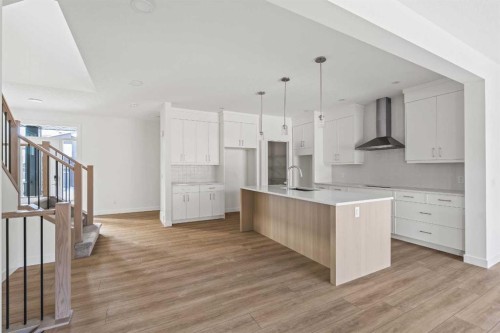 486 Lucas Way Nw, Calgary, AB - Indoor Photo Showing Kitchen With Upgraded Kitchen