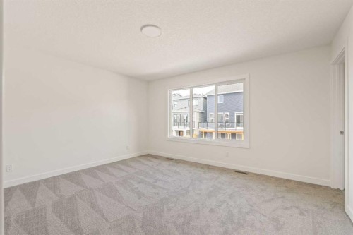 486 Lucas Way Nw, Calgary, AB - Indoor Photo Showing Other Room