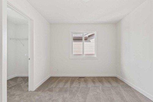 486 Lucas Way Nw, Calgary, AB - Indoor Photo Showing Other Room