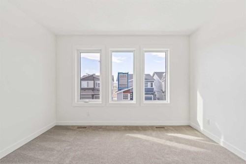486 Lucas Way Nw, Calgary, AB - Indoor Photo Showing Other Room