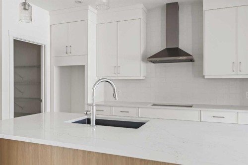 486 Lucas Way Nw, Calgary, AB - Indoor Photo Showing Kitchen With Upgraded Kitchen