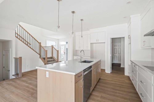 486 Lucas Way Nw, Calgary, AB - Indoor Photo Showing Kitchen With Upgraded Kitchen