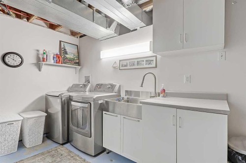 42 Sundown Close Se, Calgary, AB - Indoor Photo Showing Laundry Room