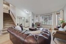 42 Sundown Close Se, Calgary, AB  - Indoor Photo Showing Living Room 