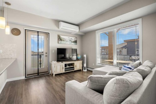 401-150 Auburn Meadows Manor Se, Calgary, AB - Indoor Photo Showing Living Room