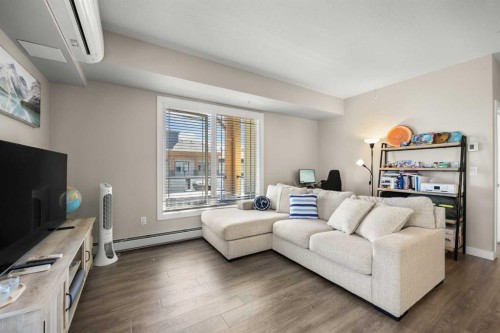 401-150 Auburn Meadows Manor Se, Calgary, AB - Indoor Photo Showing Living Room