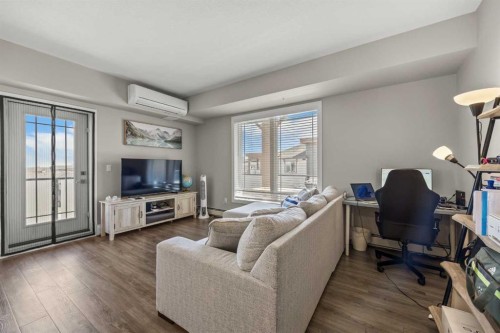 401-150 Auburn Meadows Manor Se, Calgary, AB - Indoor Photo Showing Living Room